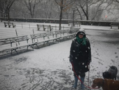 woman w 2 dogs in snow rsd P1000074